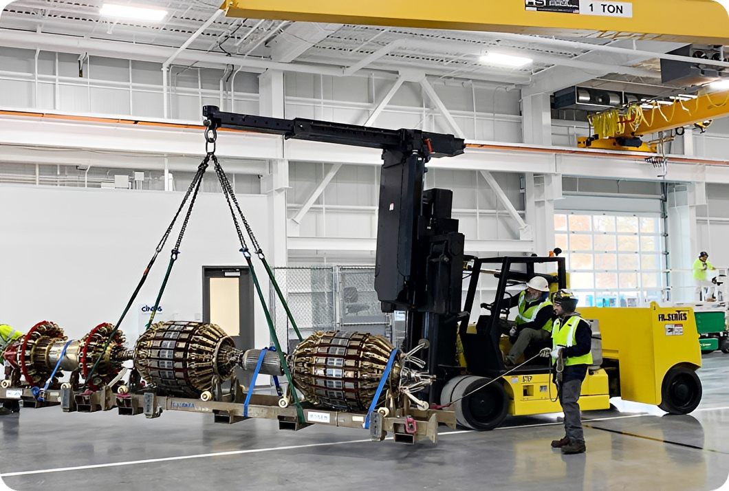 Industrial workers using a specialized lifting machine